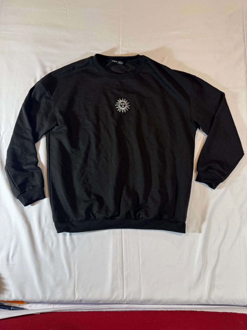 SHEIN Black Crewneck Sweatshirt with Small White Sun Motif